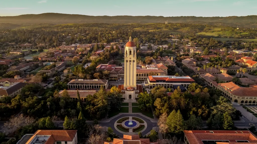 Aerial view of Stanford University and Hoover Tower at dawn.