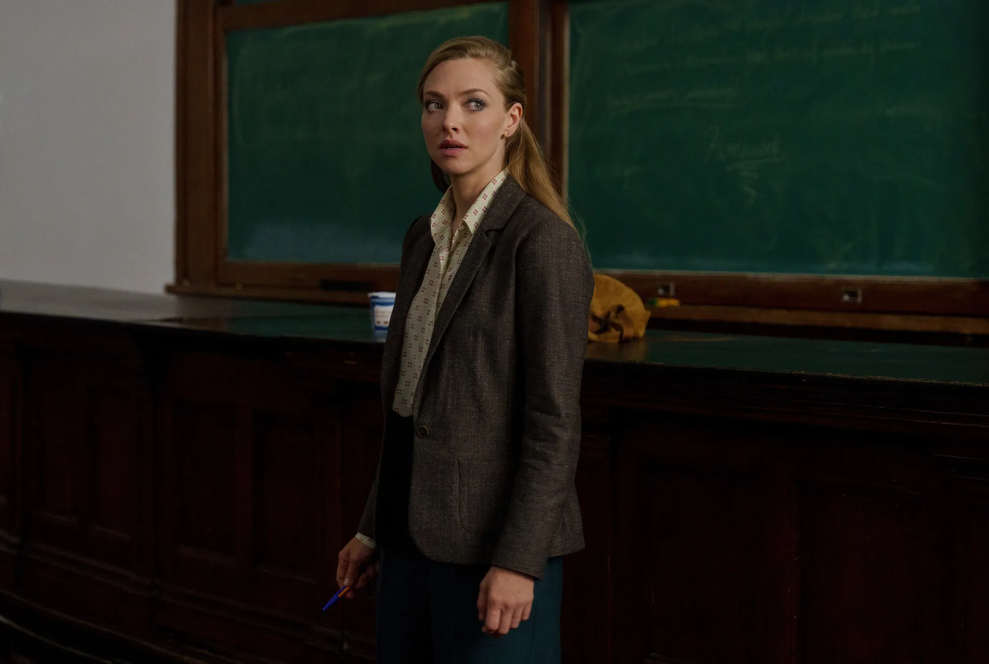 Amanda Seyfried in a classroom setting for 'The Crowded Room'.