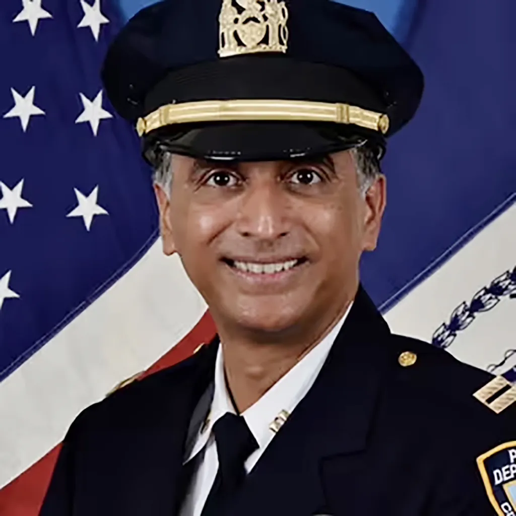 Portrait of Deputy Inspector Amanjeet S. Sandhu in uniform.