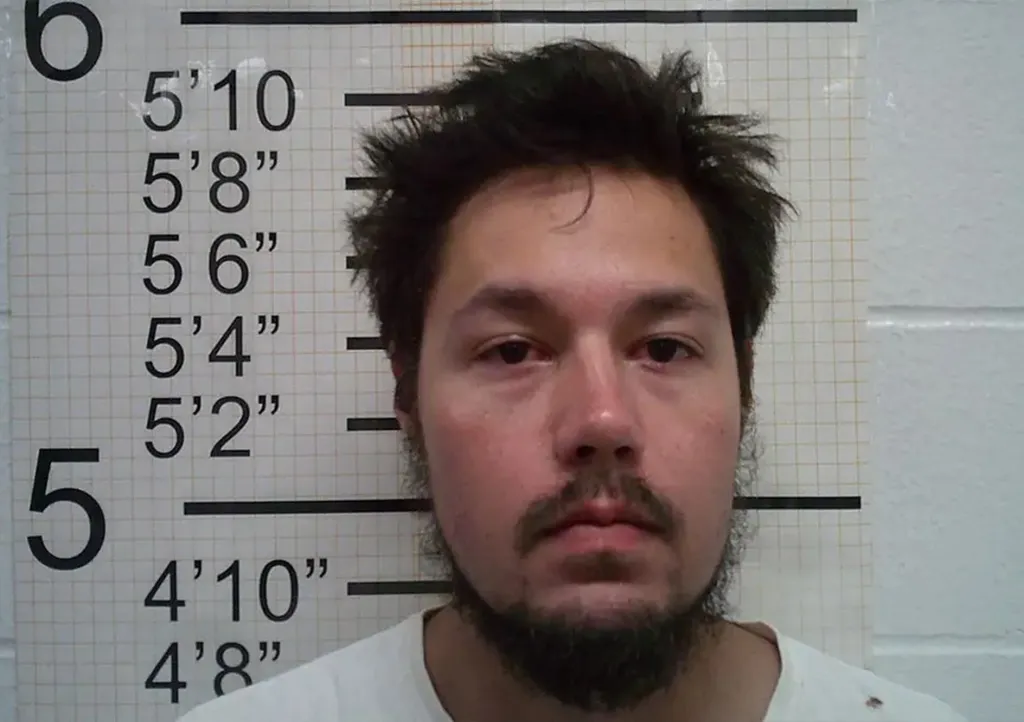Andrew Darrick Tanaka faces four counts of attempted murder for allegedly shooting at passing cars on I-35 in Warren County, Iowa.