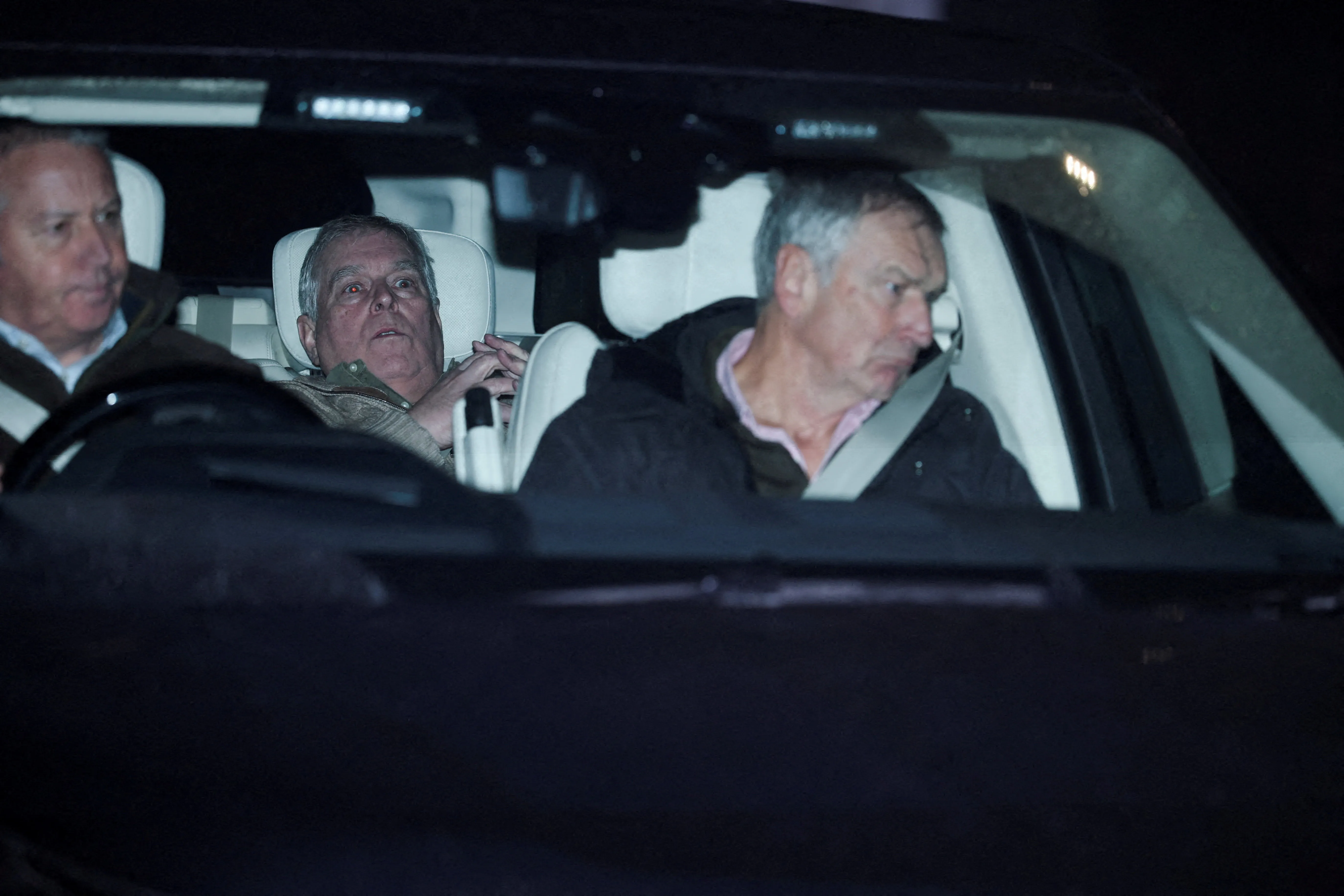 Andrew Mountbatten-Windsor leaves Aylsham Police Station in a vehicle after his arrest.