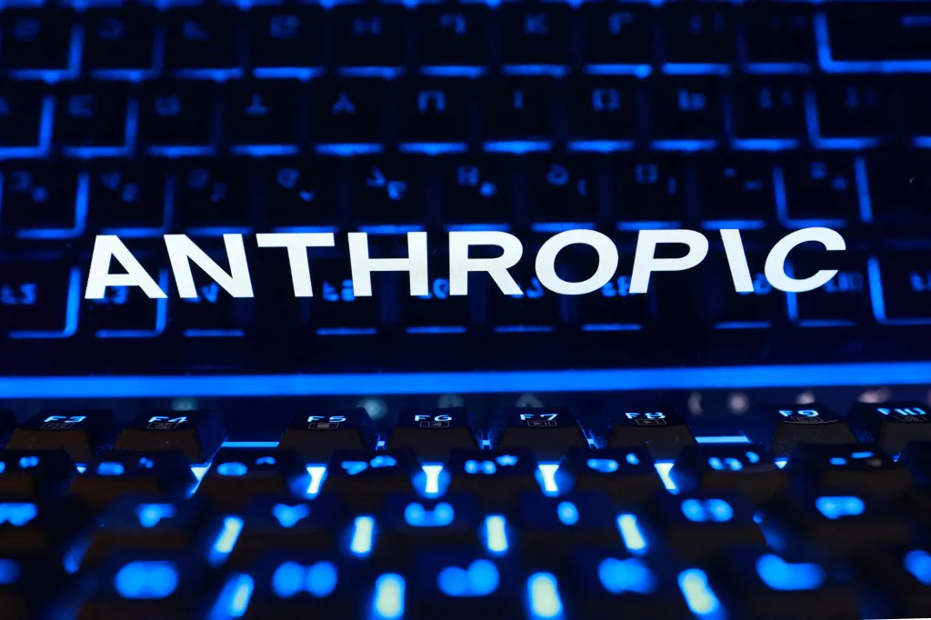 Illustration of the Anthropic logo displayed on a glowing blue keyboard.