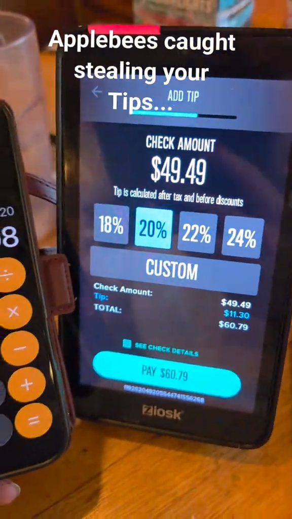 An Applebee's Ziosk tablet showing a suggested tip of $11.30 on a $49.49 bill next to a phone with a calculator app open.