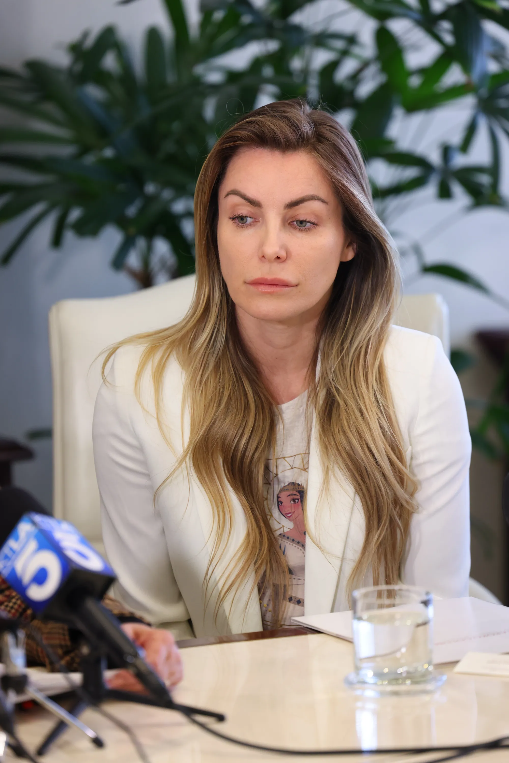 Crystal Hefner at a press conference.