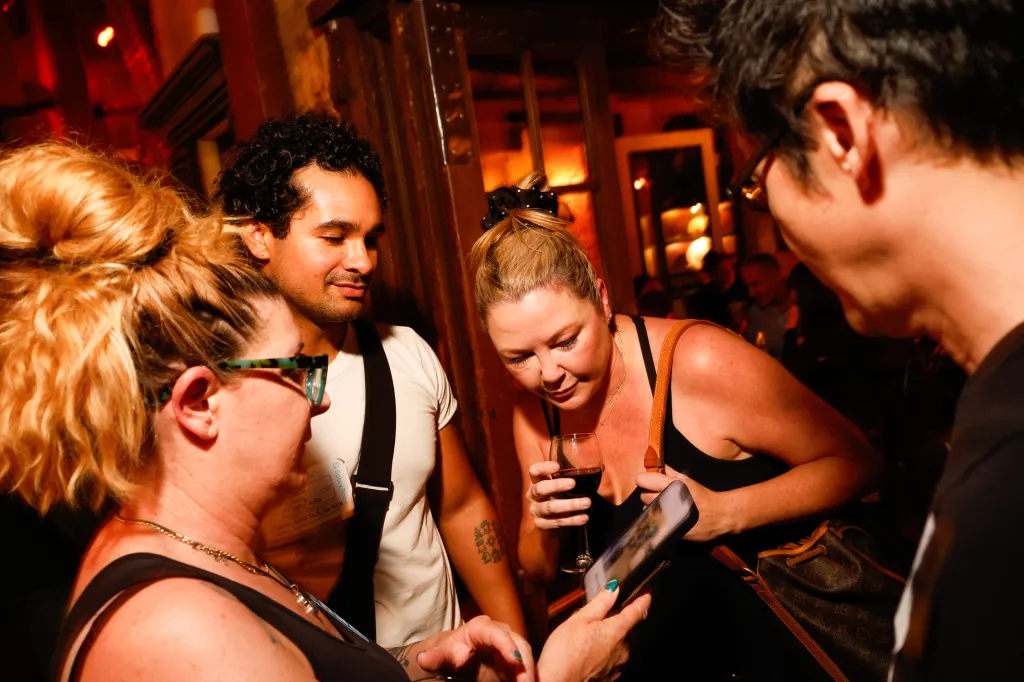 People gather at the Speed Roommating event at Sassafras Saloon in Los Angeles.