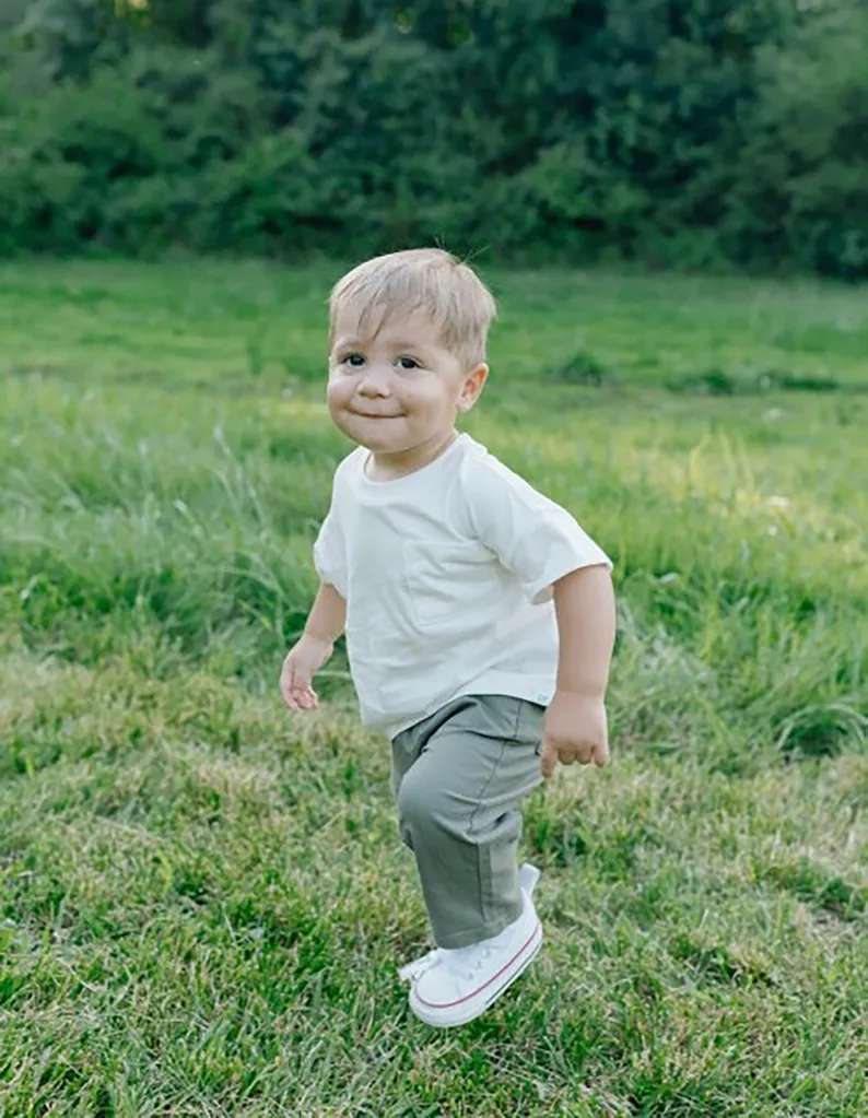 Knox Rocky Skelton running in a grassy field.