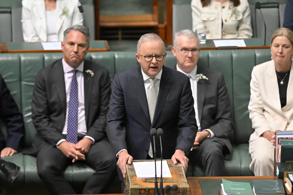 Australia's Parliament resumed under heightened security as lawmakers paid tribute to MP Helen Haines, who was seriously injured in an SUV attack.