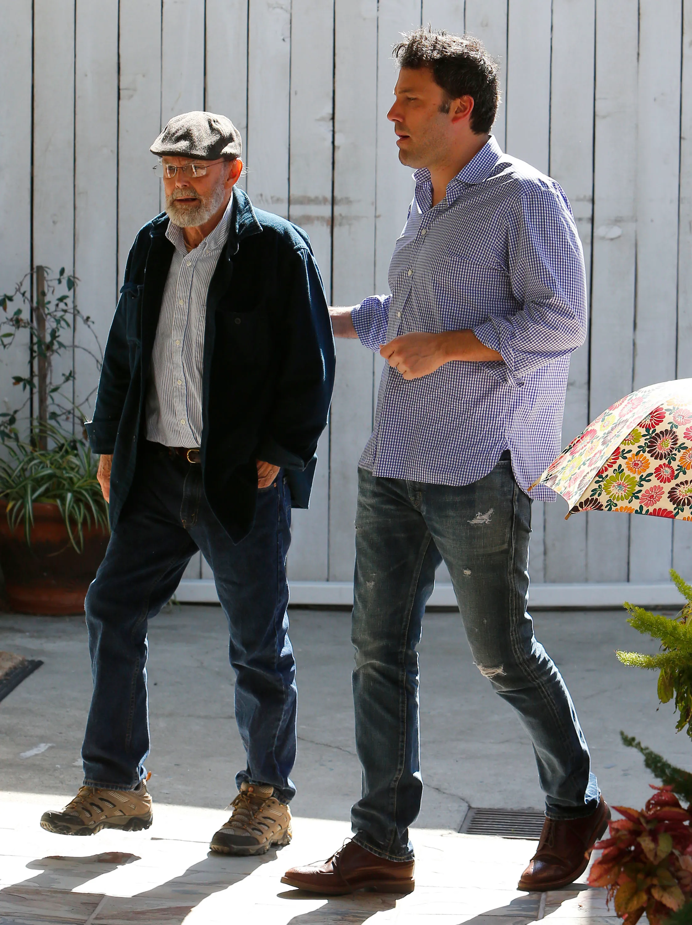 Actor Ben Affleck and his father Timothy Affleck walking together outdoors.