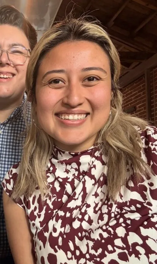 Berenice Ballinas smiling and posing for a photo.