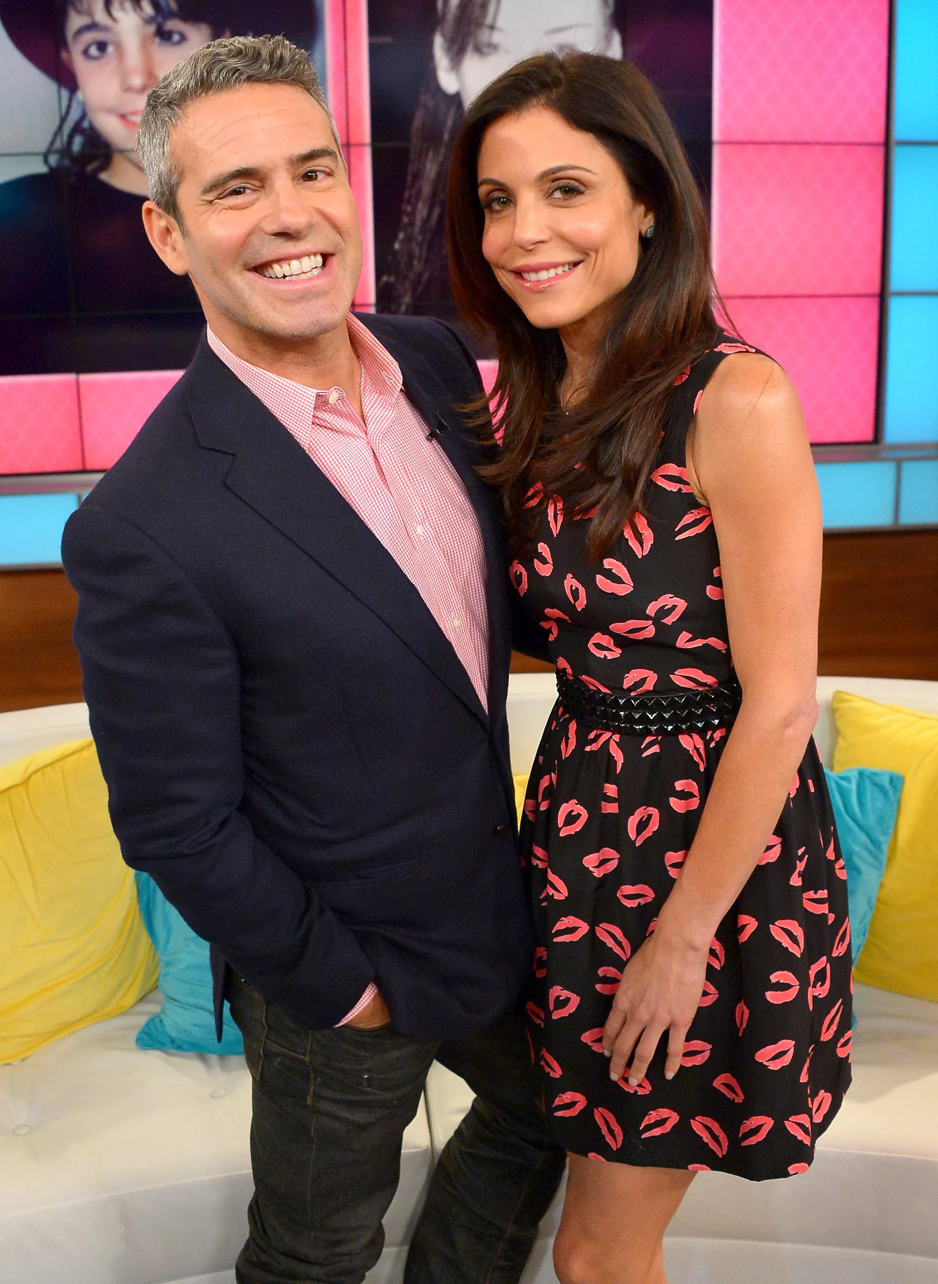 Bethenny Frankel and Andy Cohen pose together on set.