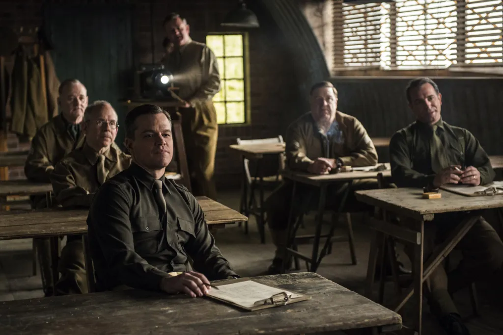 Bill Murray, Bob Balaban, Matt Damon, Hugh Bonneville, John Goodman, and Jean Dujardin in a scene from