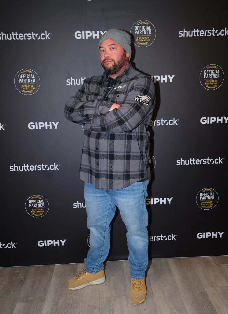 Jon Gosselin stands with arms crossed against a step-and-repeat backdrop featuring Shutterstock, Giphy, and Sundance Film Festival logos.