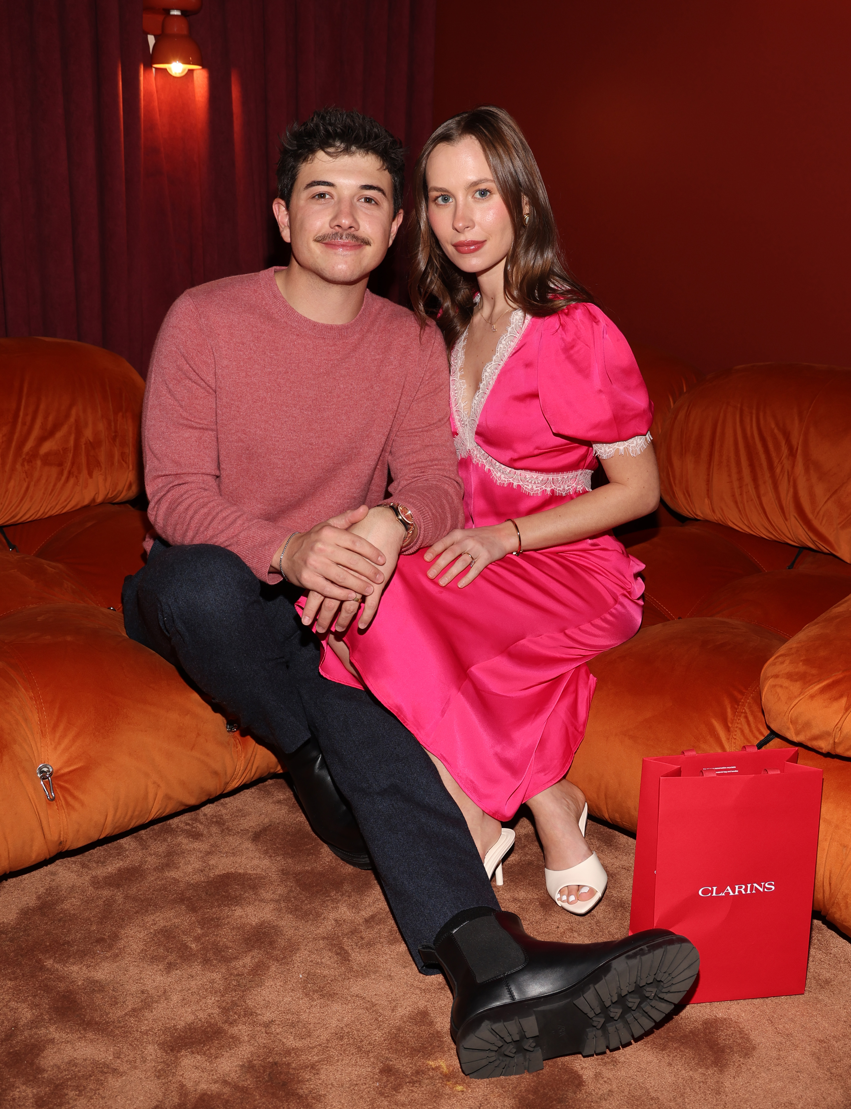 Bradley Steven Perry and Natasha Bure attending the Clarins Iconic Lip Perfector with a Sugar & Shine Galentine's Event.