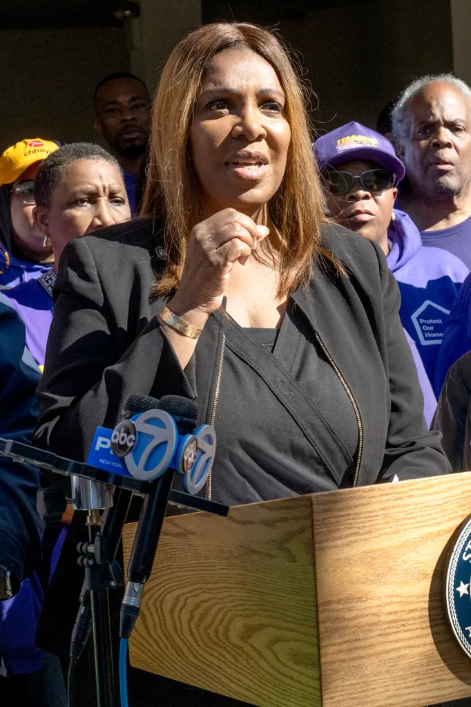 New York Attorney General Letitia James speaks at a press conference regarding home theft, flanked by Bronx District Attorney Darcel Clark and community members.