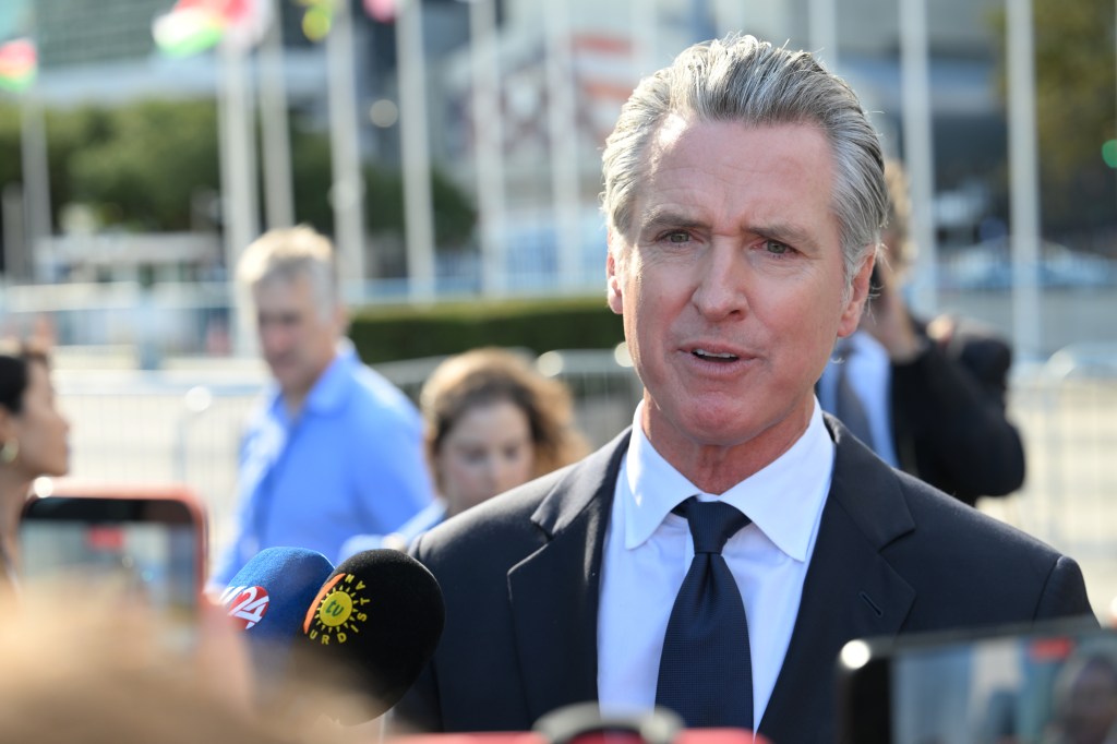California Governor Gavin Newsom speaks with reporters outside the United Nations Headquarters in New York City.