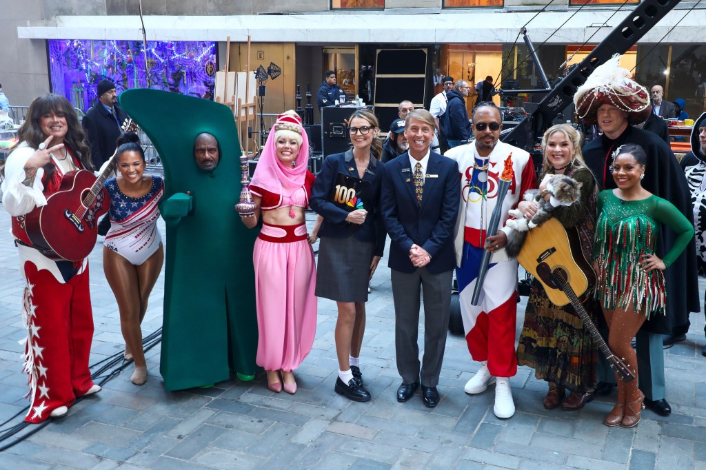 Carson Daly, Laura Jarrett, Al Roker, Dylan Dreyer, Savannah Guthrie, Jack McBrayer, Craig Melvin, Jenna Bush Hager, Willie Geist and Sheinelle Jones pose during NBC's Today show Halloween celebration at Rockefeller Plaza.