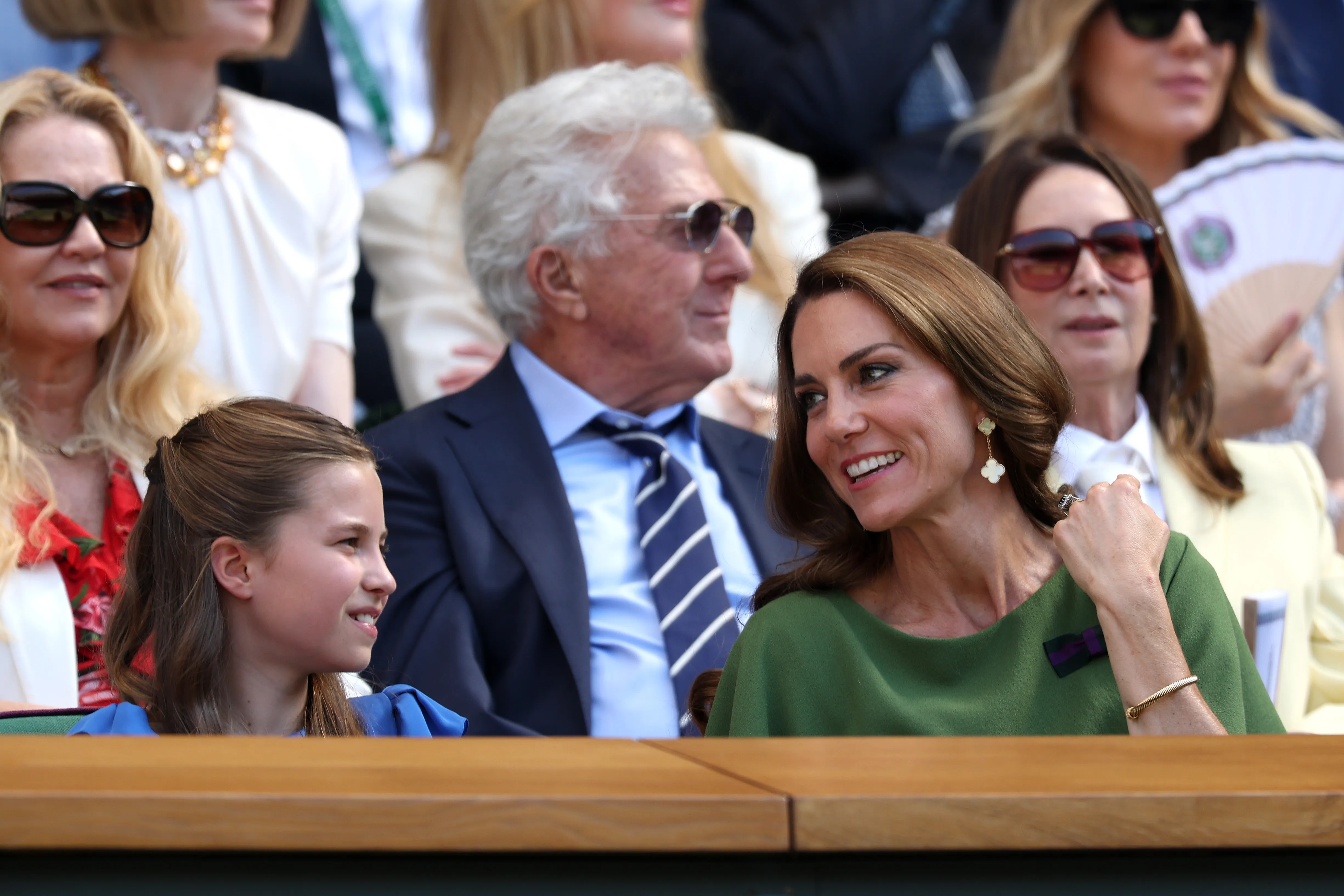 Catherine, Princess of Wales, and Princess Charlotte seated in the Royal Box.