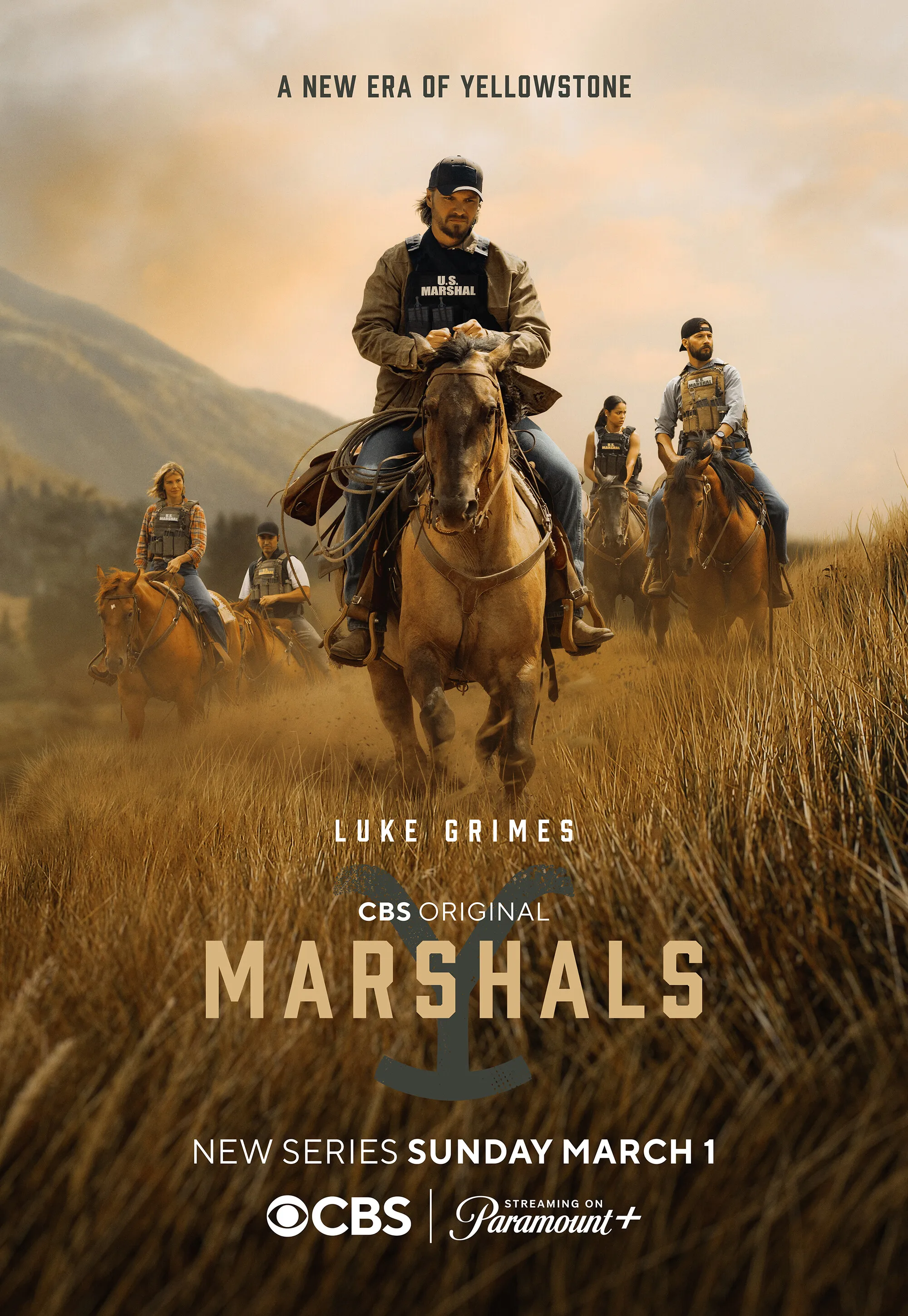 Key art for the CBS original series Marshals, featuring Luke Grimes and other U.S. Marshals on horseback in a field.