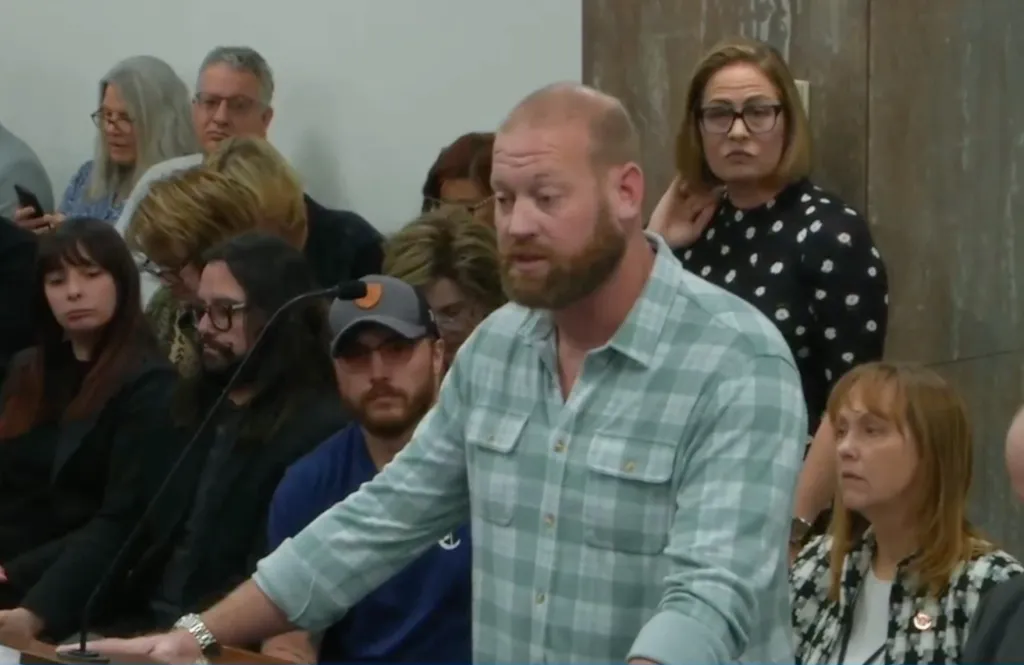 Kyrsten Sinema and her bodyguard Matthew Ammel at a public event.
