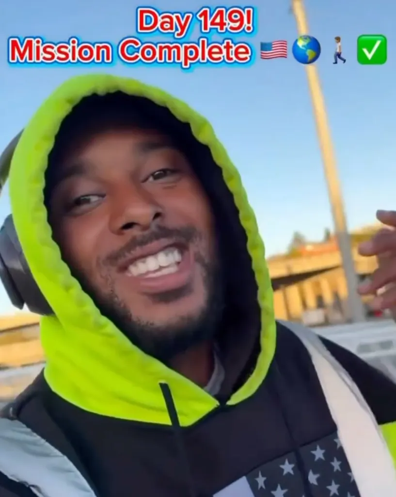 Chantz Rivera smiling in San Francisco after walking 2,500 miles from New York.