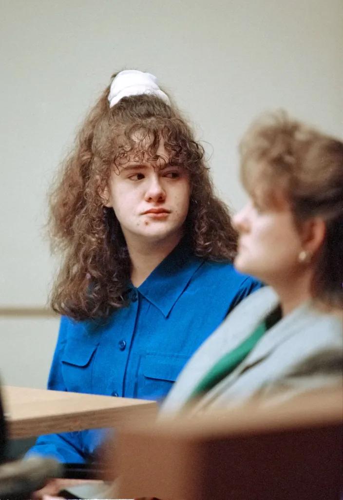 Christa Gail Pike looking at her mother in the courtroom.