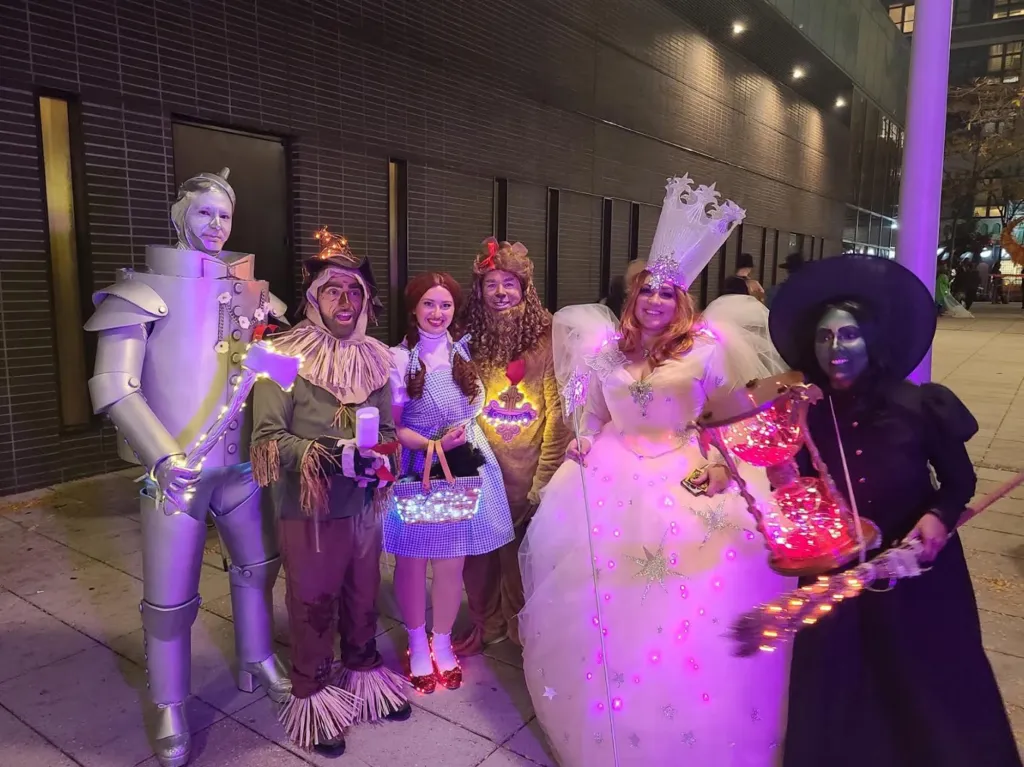 Christina Simon and her friends dressed in Wizard of Oz costumes at the Village Halloween Parade.