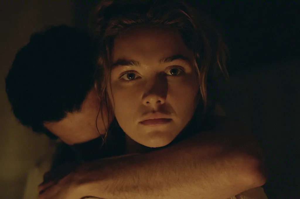 Christopher Abbott embraces Florence Pugh in a scene from