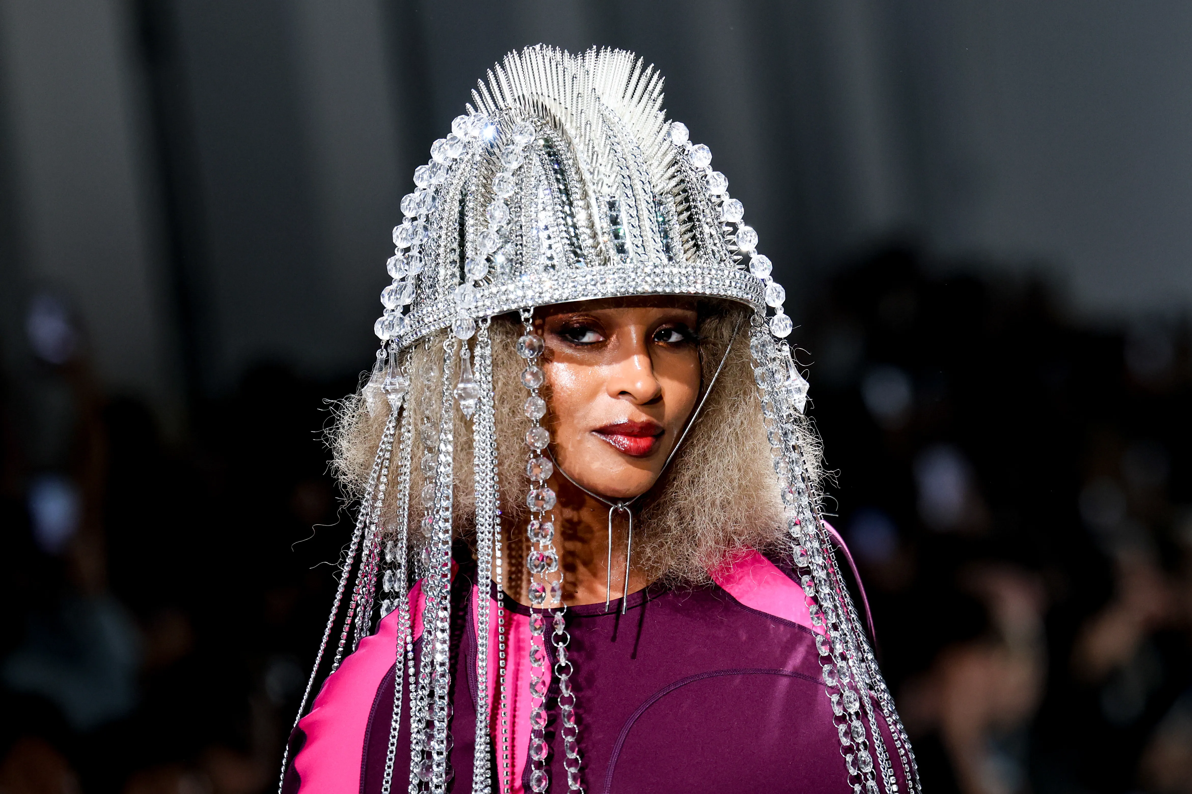 Ciara wearing an elaborate crystal-embellished headpiece on the runway at the Junya Watanabe fashion show.