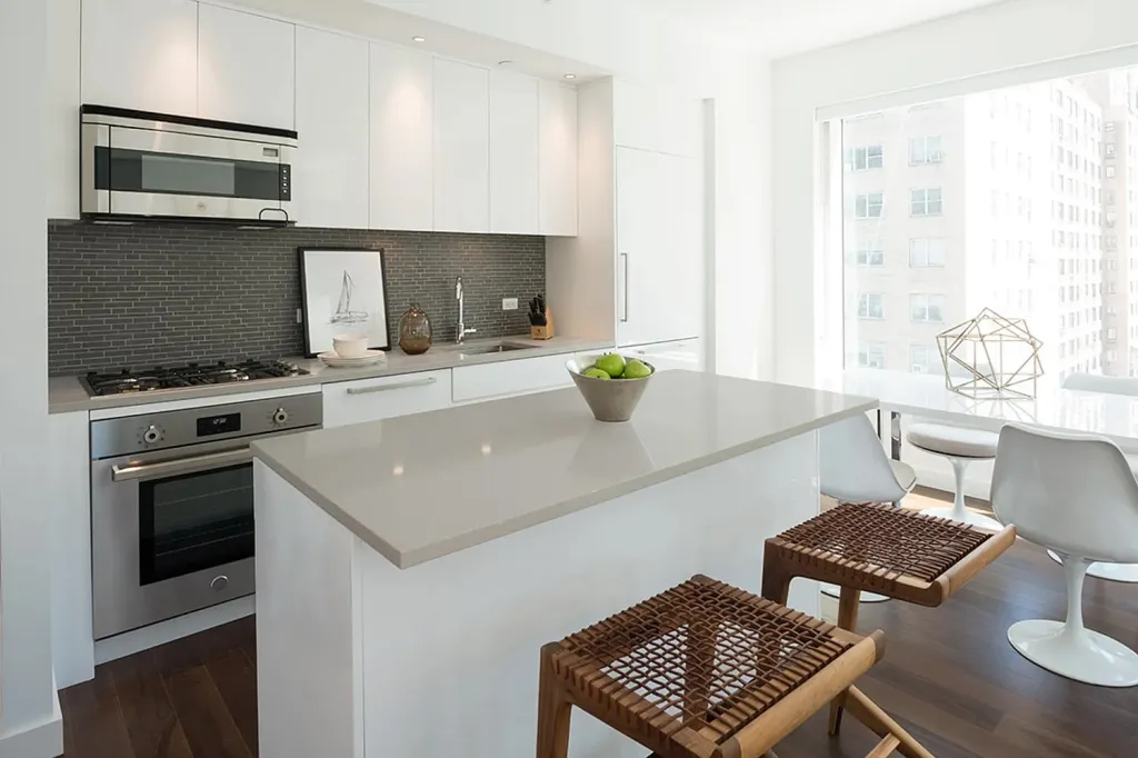 The 748-square-foot one-bedroom has a washer and dryer, and the pet-friendly building is stacked with perks, including a rock climbing wall, basketball court, game room, kids’ playroom, gym and a grill-equipped terrace.