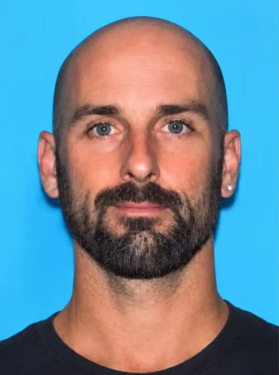 Law enforcement headshot of Clifford Gale Sayre.