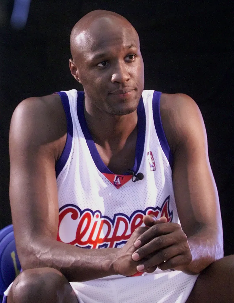 Lamar Odom wearing a Clippers jersey.