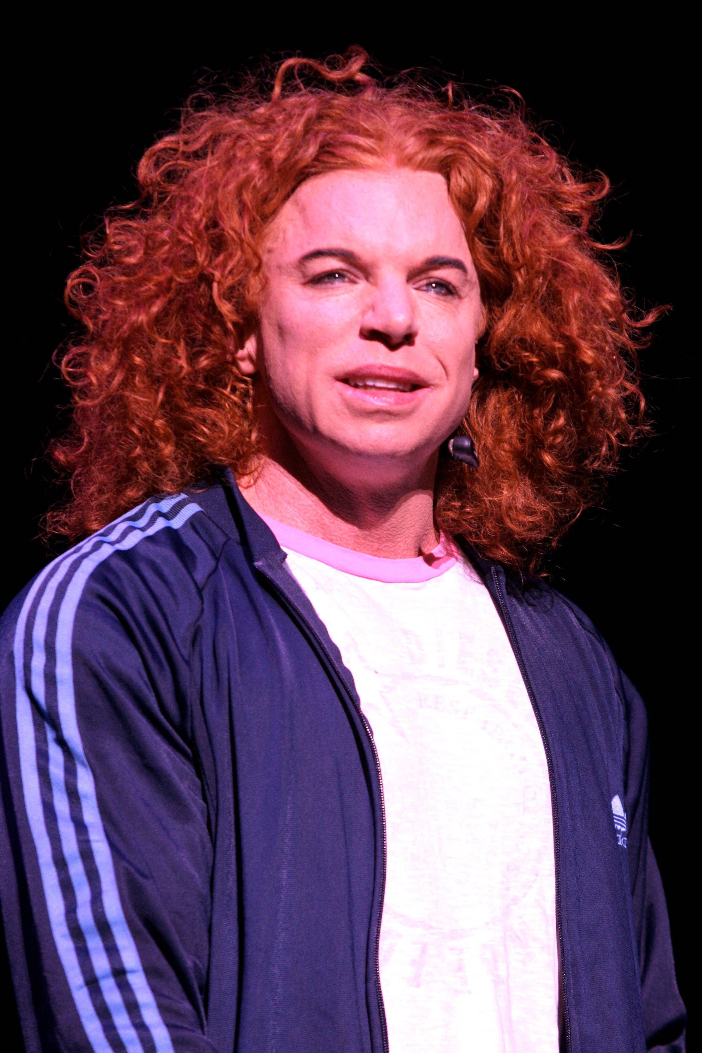 Comedian Carrot Top performing on stage.