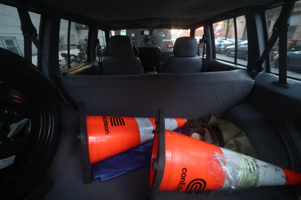 Con Ed cones inside the trunk of Carole Ann Radziwiłł's Jeep.