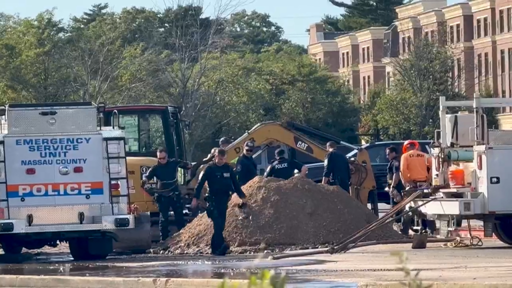 Police at the scene outside Roosevelt Field mall where a worker died while fixing a water main break on Oct. 9, 2026.