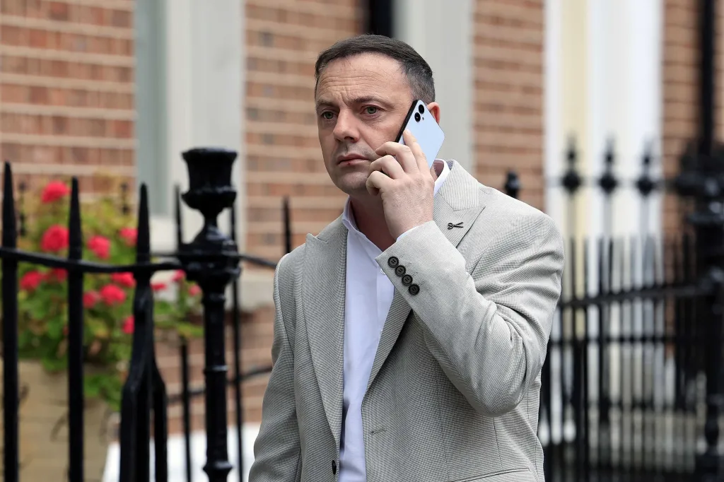 Councillor Gavin Pepper on a phone call.