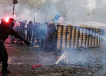 French police arrest 1,800 protesters after violent clashes and looting