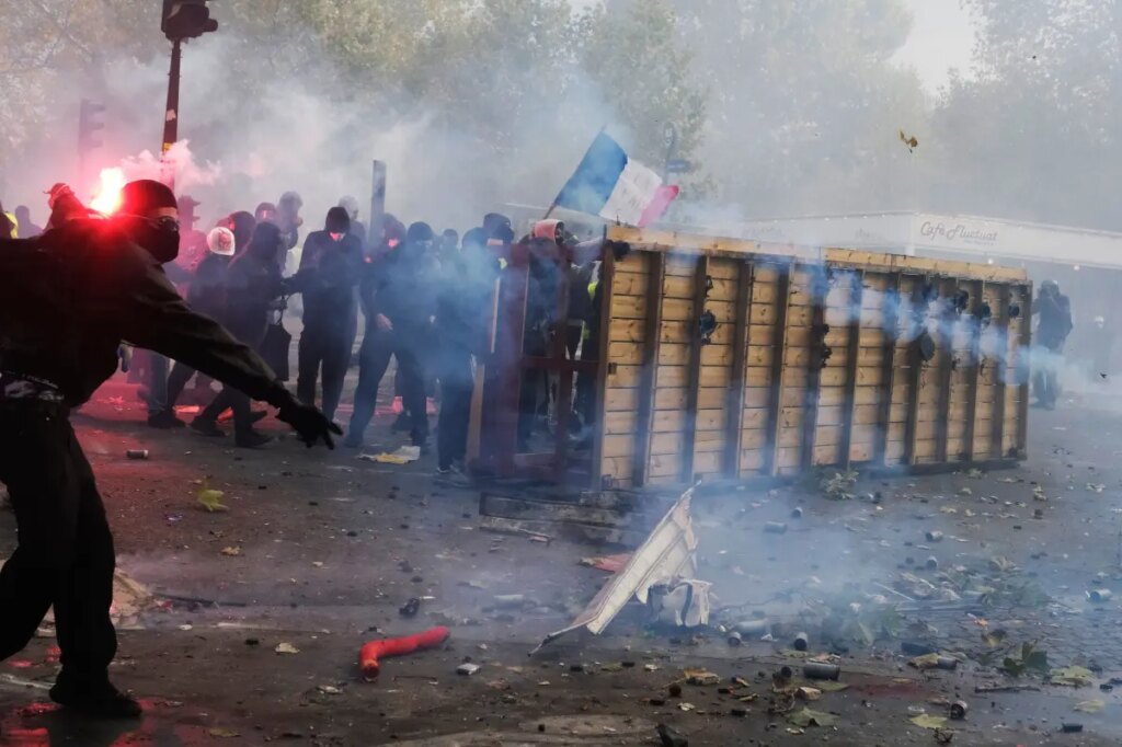 French police arrest 1,800 protesters after violent clashes and looting