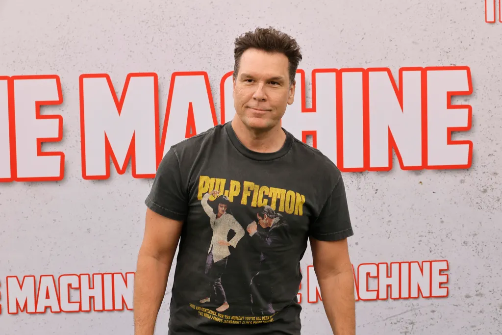 Dane Cook wearing a Pulp Fiction t-shirt at the premiere of The Machine.