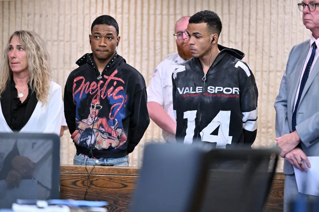 D'Angelo Caraballo and Sneider Mejia stand in court during their arraignment in Lynn, Mass.