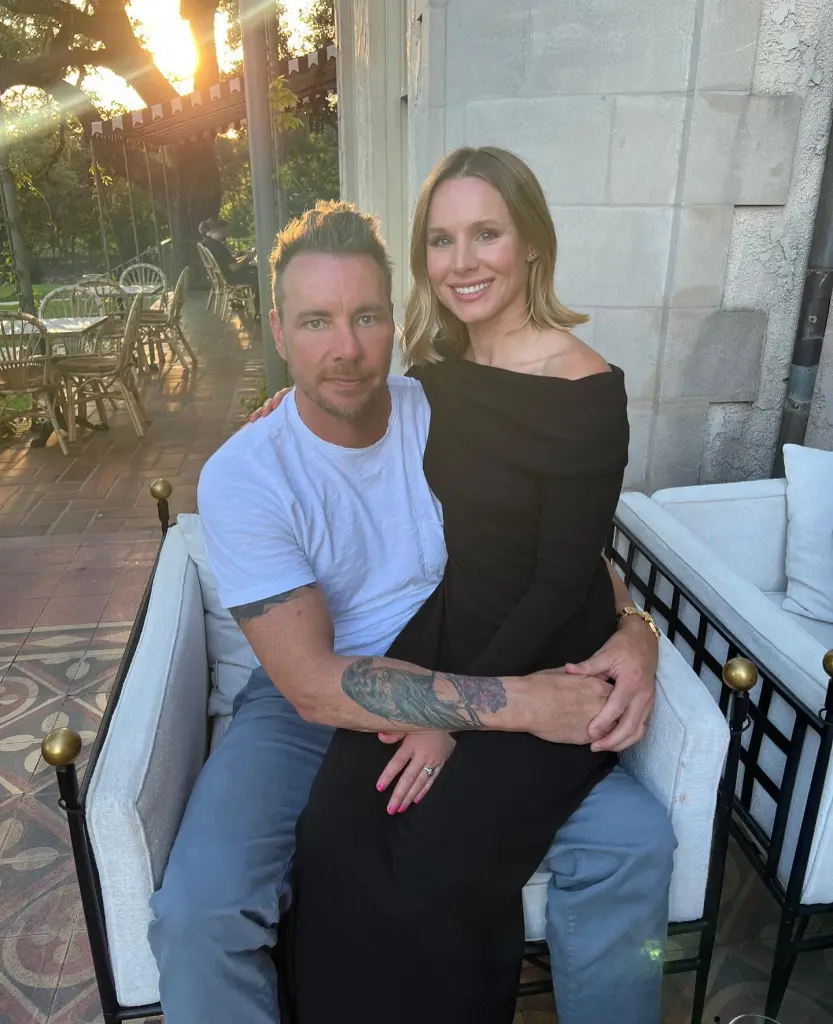 Dax Shepard and Kristen Bell sitting together outdoors.