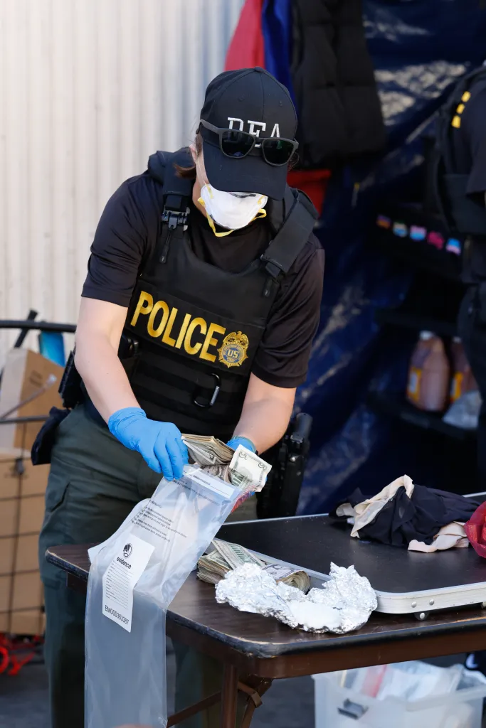 A DEA agent wearing a