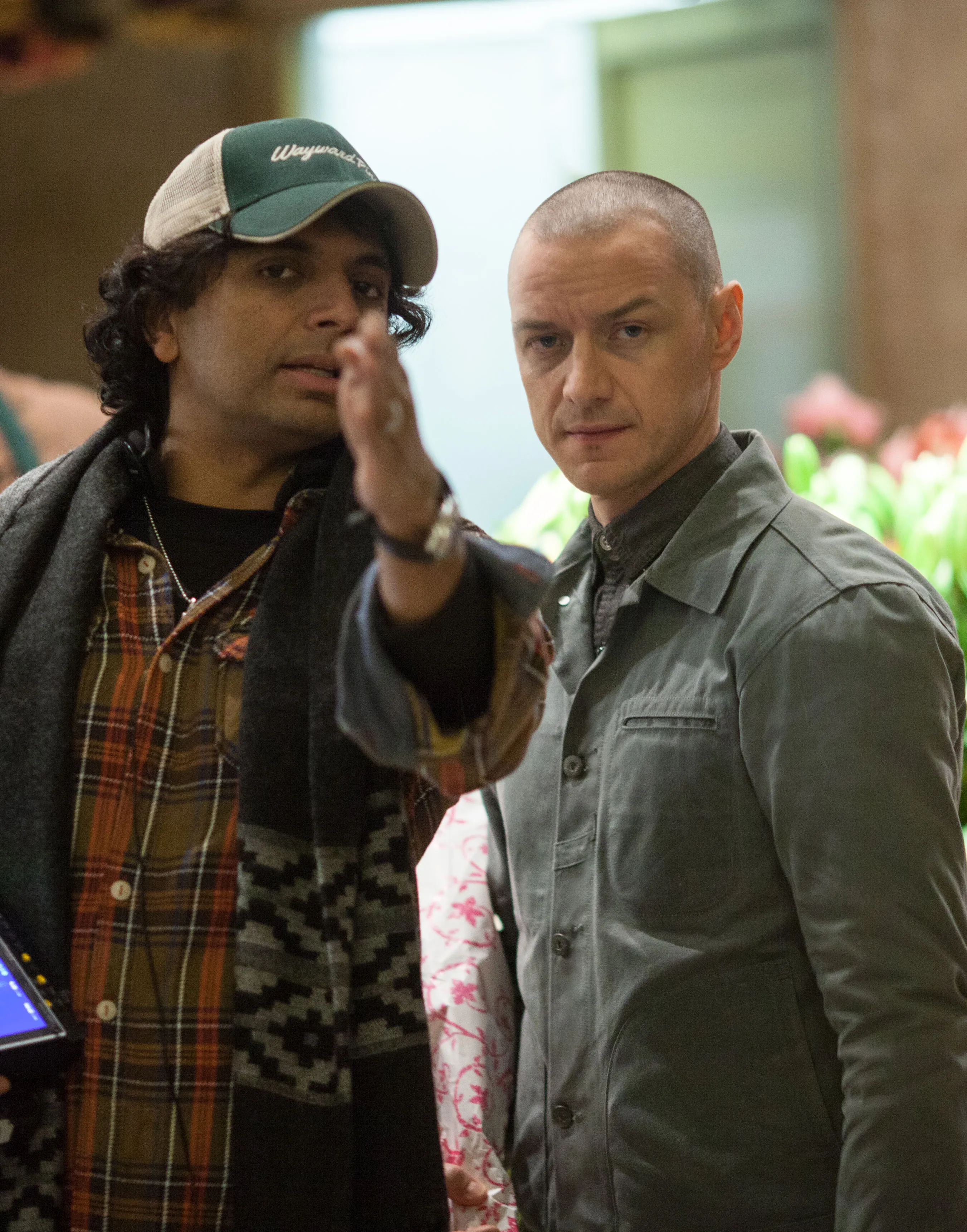 Director M. Night Shyamalan on set with actor James McAvoy.