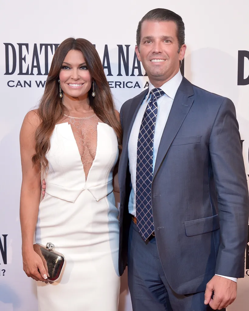 Donald Trump Jr. and Kimberly Guilfoyle standing together at a film premiere.