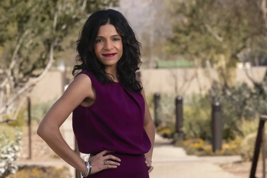 Dr. Rachna Shroff standing outdoors with her hands on her hips.
