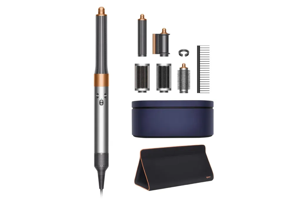 A Dyson hair curling iron with accessories.