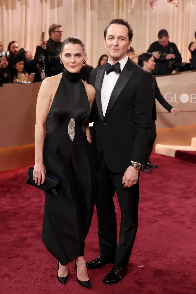 Keri Russell and Matthew Rhys attending the Golden Globe Awards.