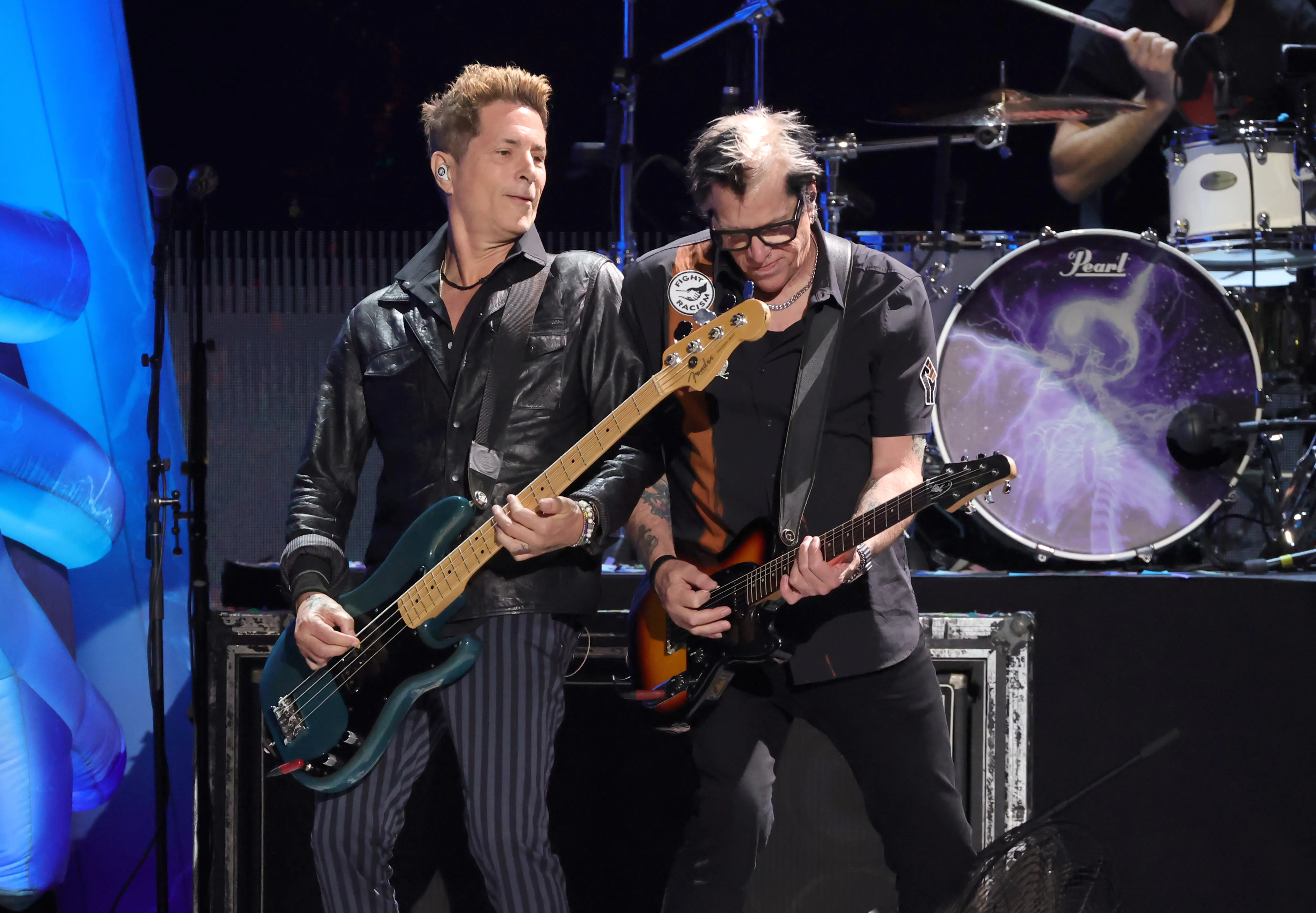 Todd Morse and Noodles of The Offspring perform onstage.