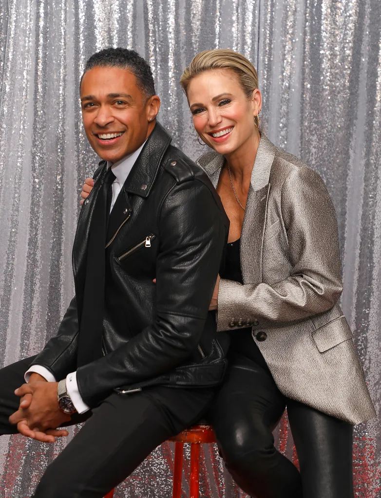 T.J. Holmes and Amy Robach pose backstage at the iHeartRadio Jingle Ball.