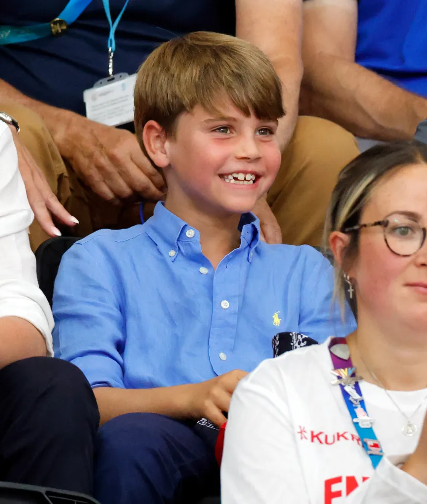 Prince Louis of Wales smiling while watching the track cycling at the Commonwealth Games.