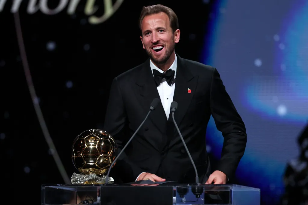 Harry Kane reacts after receiving the Ballon d'Or award during the ceremony at the Palladium Theatre in London.